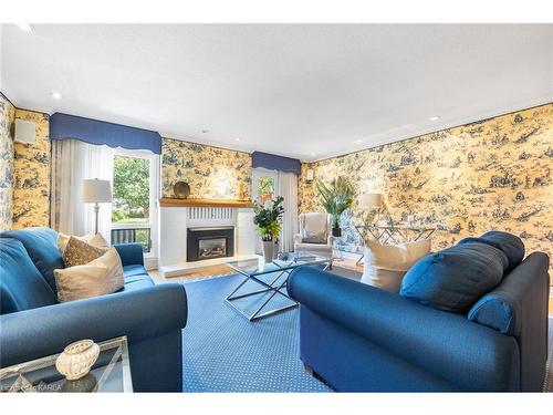 5-111 Echo Drive, Ottawa, ON - Indoor Photo Showing Living Room With Fireplace