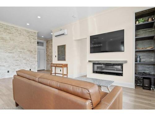 1610 County Rd 15, Picton, ON - Indoor Photo Showing Living Room With Fireplace