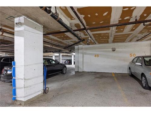 1209-165 Ontario Street, Kingston, ON - Indoor Photo Showing Garage