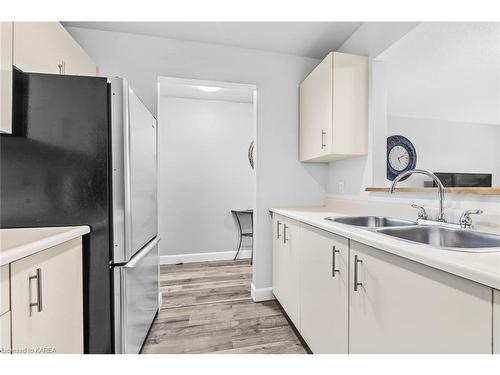 207-566 Armstrong Road, Kingston, ON - Indoor Photo Showing Kitchen With Double Sink