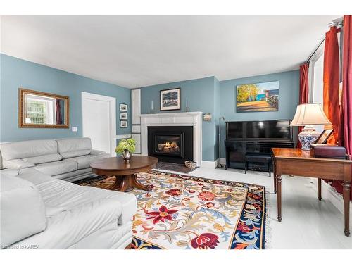 2750 Front Road, Stella, ON - Indoor Photo Showing Living Room With Fireplace