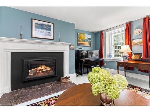 2750 Front Road, Stella, ON - Indoor Photo Showing Living Room With Fireplace