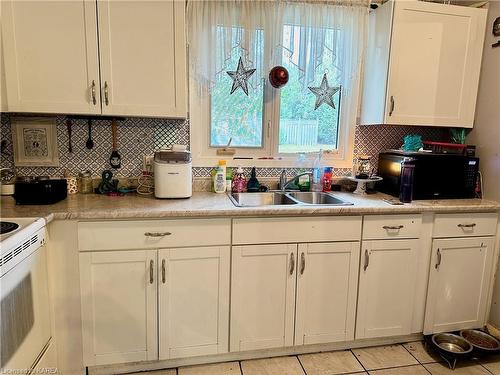 13 Coventry Crescent, Kingston, ON - Indoor Photo Showing Kitchen With Double Sink