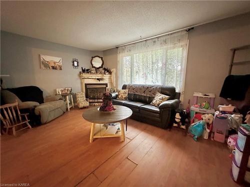 13 Coventry Crescent, Kingston, ON - Indoor Photo Showing Living Room With Fireplace