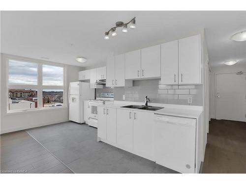 406-1080 Terra Verde Way, Kingston, ON - Indoor Photo Showing Kitchen With Double Sink