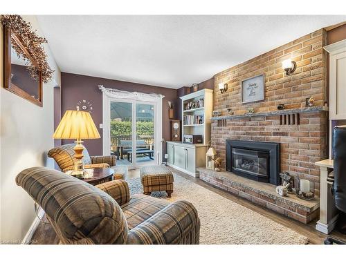 914 Rowantree Crescent, Kingston, ON - Indoor Photo Showing Living Room With Fireplace