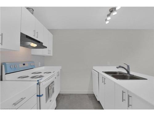 310-1080 Terra Verde Way, Kingston, ON - Indoor Photo Showing Kitchen With Double Sink