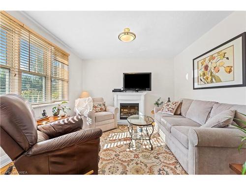 4 Montgomery Boulevard, Kingston, ON - Indoor Photo Showing Living Room With Fireplace