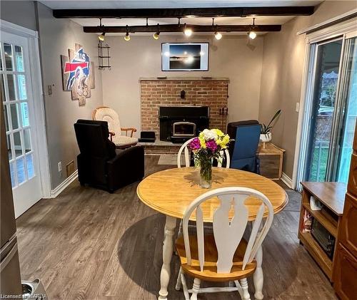 91 Inverness Crescent, Kingston, ON - Indoor Photo Showing Dining Room With Fireplace