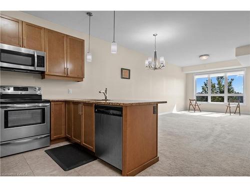 310-740 Augusta Drive, Kingston, ON - Indoor Photo Showing Kitchen With Stainless Steel Kitchen