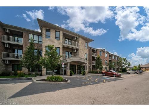 310-740 Augusta Drive, Kingston, ON - Outdoor With Balcony With Facade