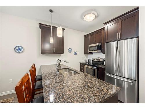 112-740 Augusta Drive, Kingston, ON - Indoor Photo Showing Kitchen With Stainless Steel Kitchen With Double Sink With Upgraded Kitchen