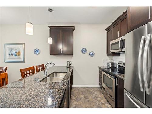 112-740 Augusta Drive, Kingston, ON - Indoor Photo Showing Kitchen With Stainless Steel Kitchen With Double Sink With Upgraded Kitchen