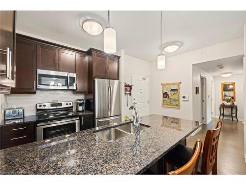 112-740 Augusta Drive, Kingston, ON - Indoor Photo Showing Kitchen With Stainless Steel Kitchen With Double Sink With Upgraded Kitchen