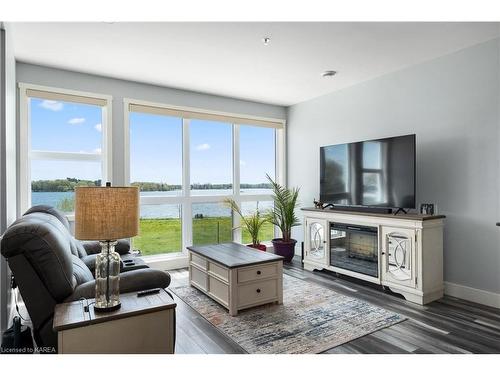 206-130 Water Street Street, Gananoque, ON - Indoor Photo Showing Living Room With Fireplace