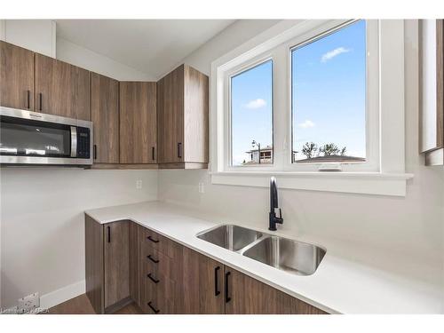 136 Mcdonough Crescent, Amherstview, ON - Indoor Photo Showing Kitchen With Double Sink