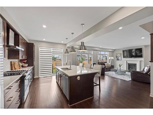 713 Riverview Way, Kingston, ON - Indoor Photo Showing Kitchen With Fireplace With Double Sink With Upgraded Kitchen