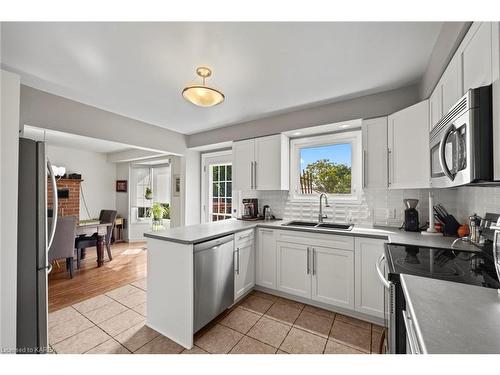 153 Grenadier Drive, Kingston, ON - Indoor Photo Showing Kitchen With Double Sink