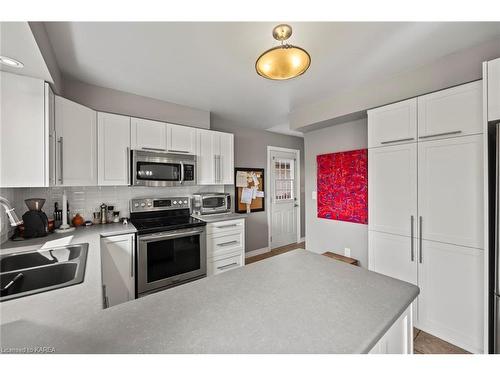 153 Grenadier Drive, Kingston, ON - Indoor Photo Showing Kitchen With Double Sink