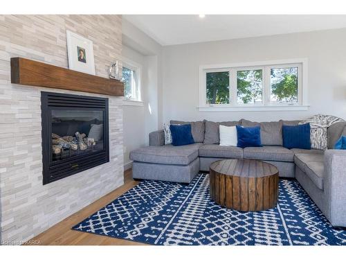 4506 Bath Road, Amherstview, ON - Indoor Photo Showing Living Room With Fireplace