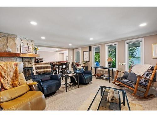 3909 Stone Point Road, Inverary, ON - Indoor Photo Showing Living Room With Fireplace