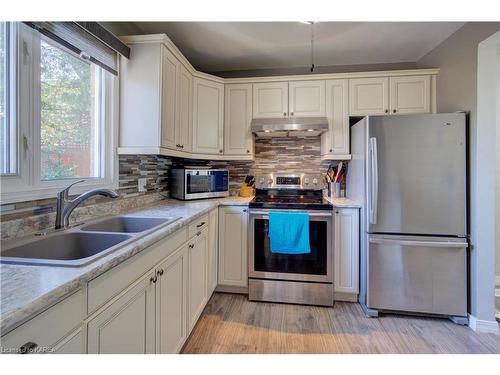 67-22 Coventry Crescent, Kingston, ON - Indoor Photo Showing Kitchen With Double Sink