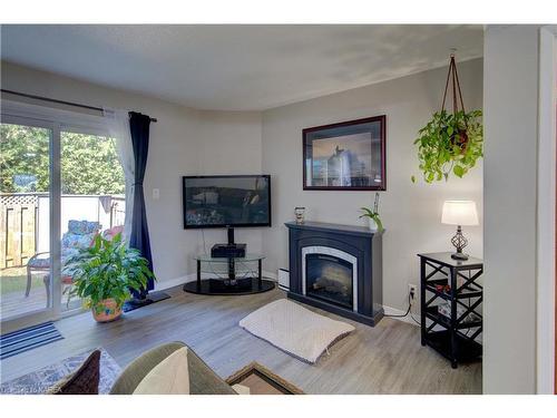 67-22 Coventry Crescent, Kingston, ON - Indoor Photo Showing Living Room With Fireplace