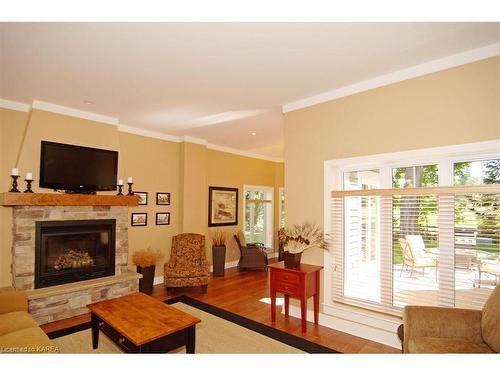 10-3-532 10Th Concession Road, Westport, ON - Indoor Photo Showing Living Room With Fireplace