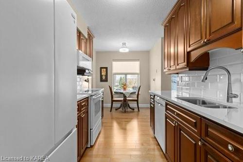 204-185 Ontario Street, Kingston, ON - Indoor Photo Showing Kitchen With Double Sink