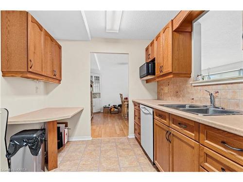 304-257 Bath Road, Kingston, ON - Indoor Photo Showing Kitchen With Double Sink