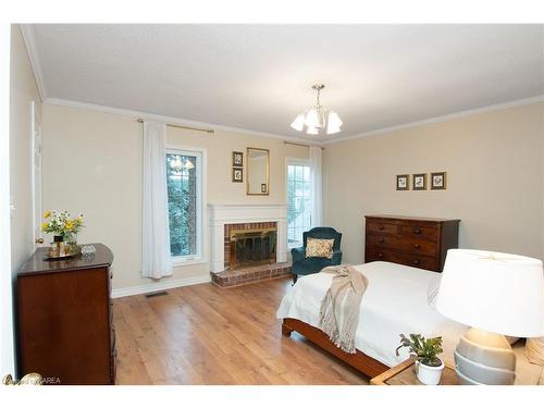 196 Country Club Drive, Kingston, ON - Indoor Photo Showing Bedroom With Fireplace