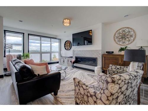 308-130 Water Street Street, Gananoque, ON - Indoor Photo Showing Living Room With Fireplace