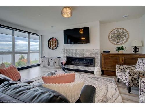 308-130 Water Street Street, Gananoque, ON - Indoor Photo Showing Living Room With Fireplace