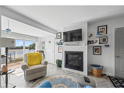 372 Dundas Street W, Napanee, ON - Indoor Photo Showing Living Room With Fireplace