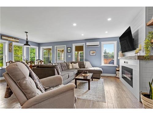 581 Concession Road 8, Westport, ON - Indoor Photo Showing Living Room With Fireplace