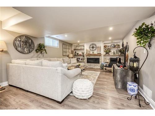 1110 Crossfield Avenue, Kingston, ON - Indoor Photo Showing Living Room With Fireplace