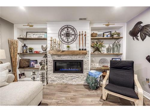 1110 Crossfield Avenue, Kingston, ON - Indoor Photo Showing Living Room With Fireplace