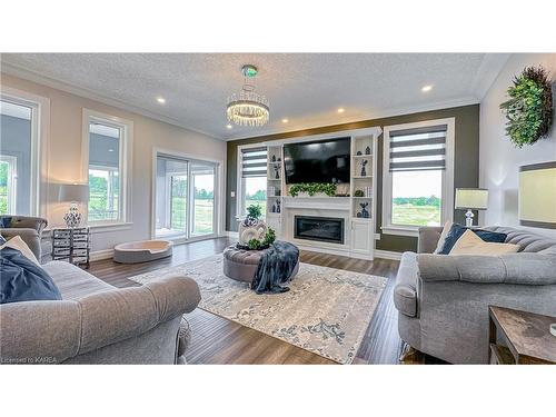 78 Aragon Road, Glenburnie, ON - Indoor Photo Showing Living Room With Fireplace