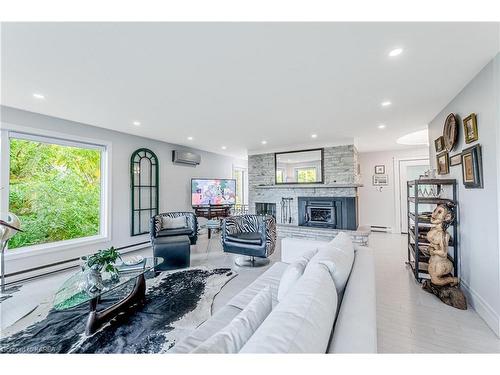 1678 South Boulevard, Kingston, ON - Indoor Photo Showing Living Room With Fireplace