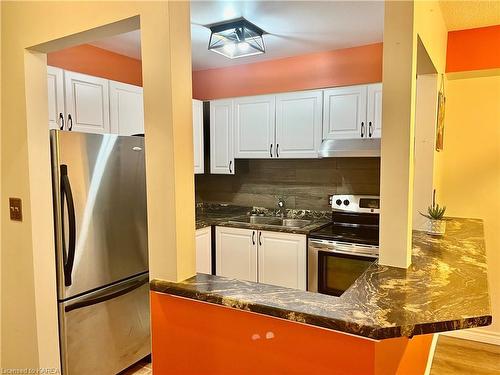 107-316 Kingsdale Avenue, Kingston, ON - Indoor Photo Showing Kitchen With Double Sink