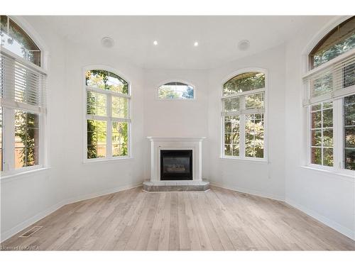 94 Manor Road, Bath, ON - Indoor Photo Showing Living Room With Fireplace