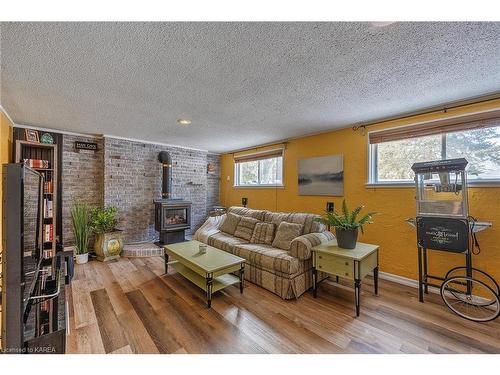 201 Old Orchard Road, Bath, ON - Indoor Photo Showing Living Room With Fireplace