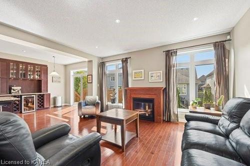 1151 Escala Crescent, Kingston, ON - Indoor Photo Showing Living Room With Fireplace