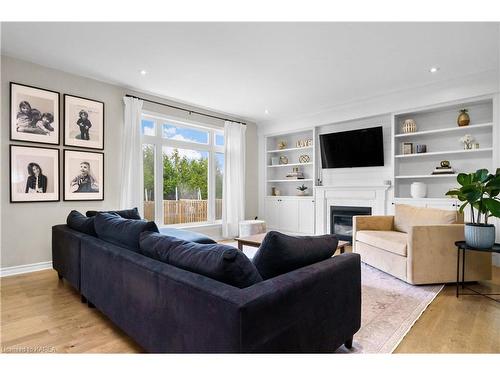 501 Savannah Court, Kingston, ON - Indoor Photo Showing Living Room With Fireplace