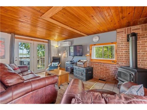 1057 Quinte Conservation Lane, Verona, ON - Indoor Photo Showing Living Room With Fireplace