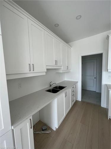 203 Superior Drive, Amherstview, ON - Indoor Photo Showing Kitchen With Double Sink