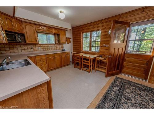 2305E Opinicon Road, Rideau Lakes, ON - Indoor Photo Showing Kitchen With Double Sink