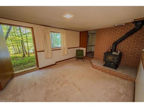 2305E Opinicon Road, Rideau Lakes, ON - Indoor Photo Showing Other Room With Fireplace