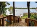 1054 Earl Bay Lane, Arden, ON  - Outdoor With Body Of Water With Deck Patio Veranda With View 