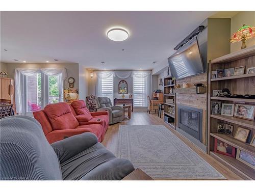 114-130 Water Street Street, Gananoque, ON - Indoor Photo Showing Living Room With Fireplace